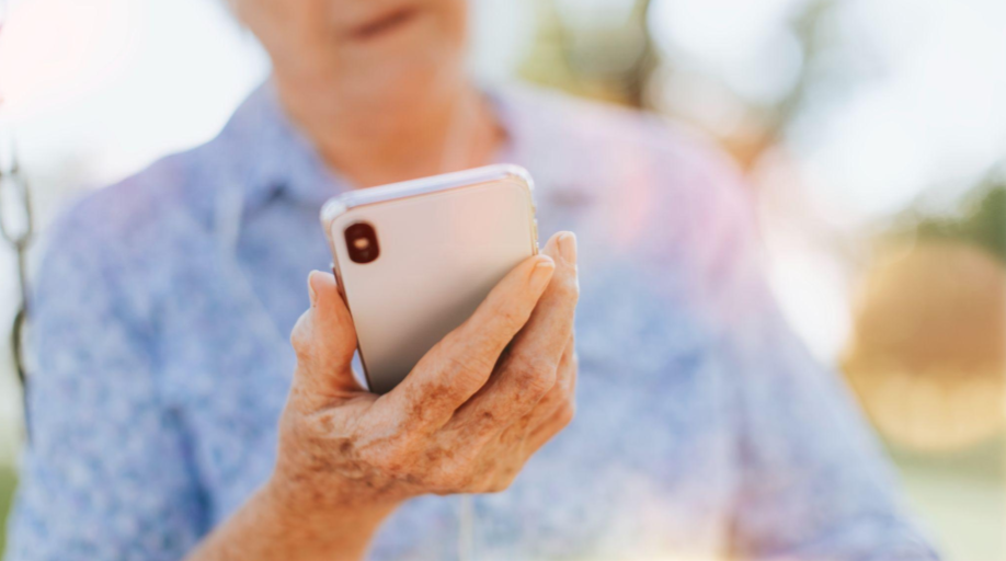 Senior using phone safely